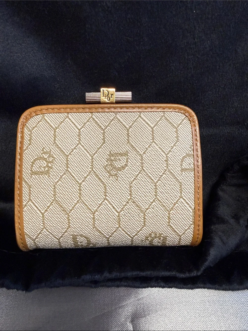 Dior honeycomb kiss lock coin purse.